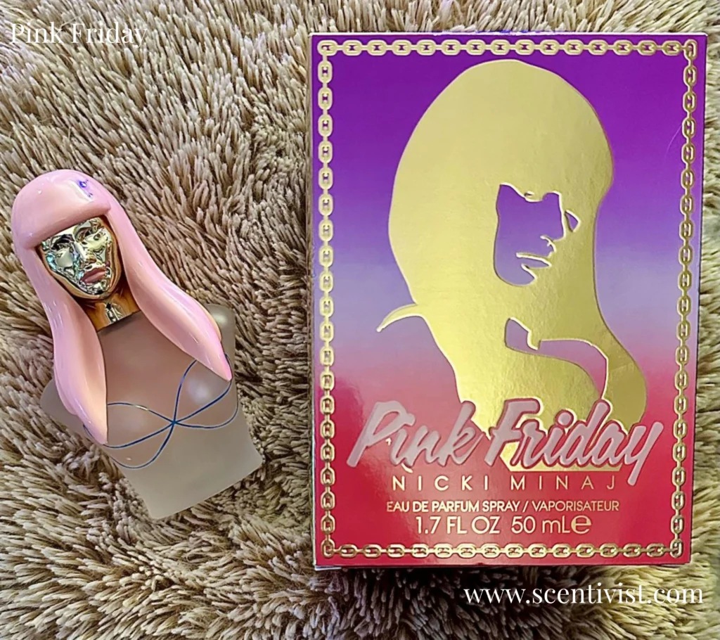Close-up of Pink Friday perfume bottle showing logo and glass details