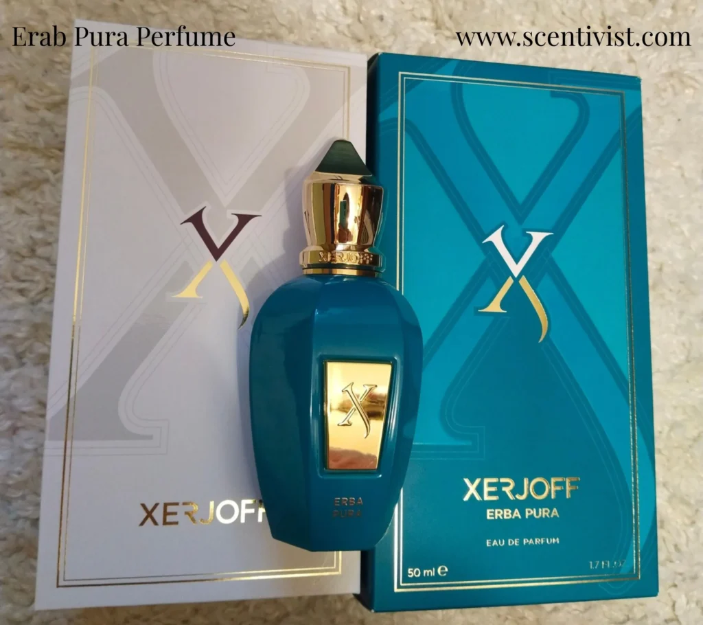 Erab Pura Perfume bottle displayed alongside its packaging, highlighting the luxurious design of both.