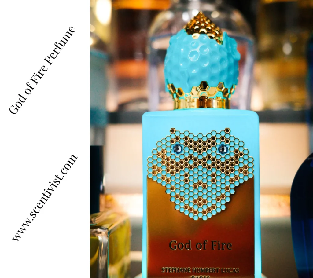 God of Fire perfume bottle standing elegantly with dramatic lighting emphasizing the blue and white design.