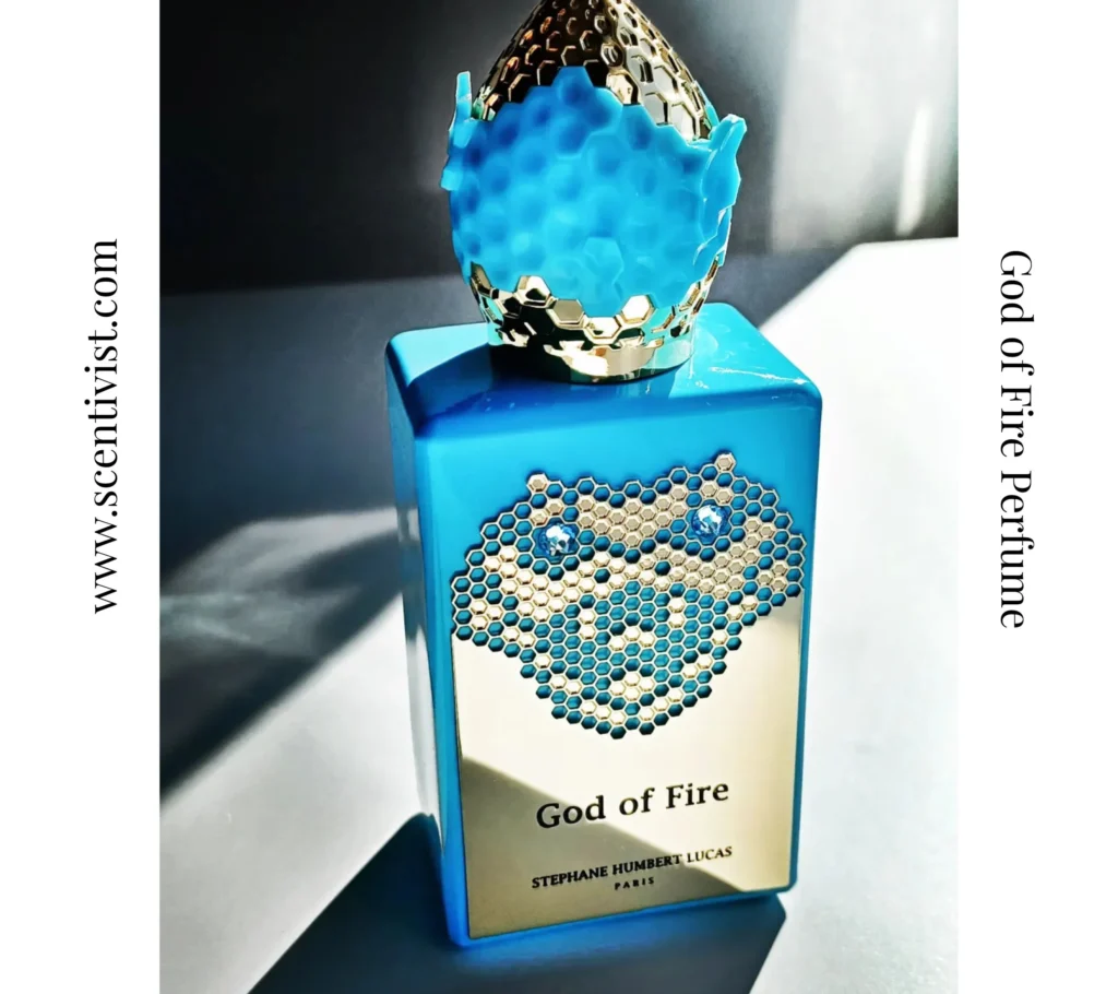 God of Fire perfume bottle with luxurious red and gold design displayed on a clean background.