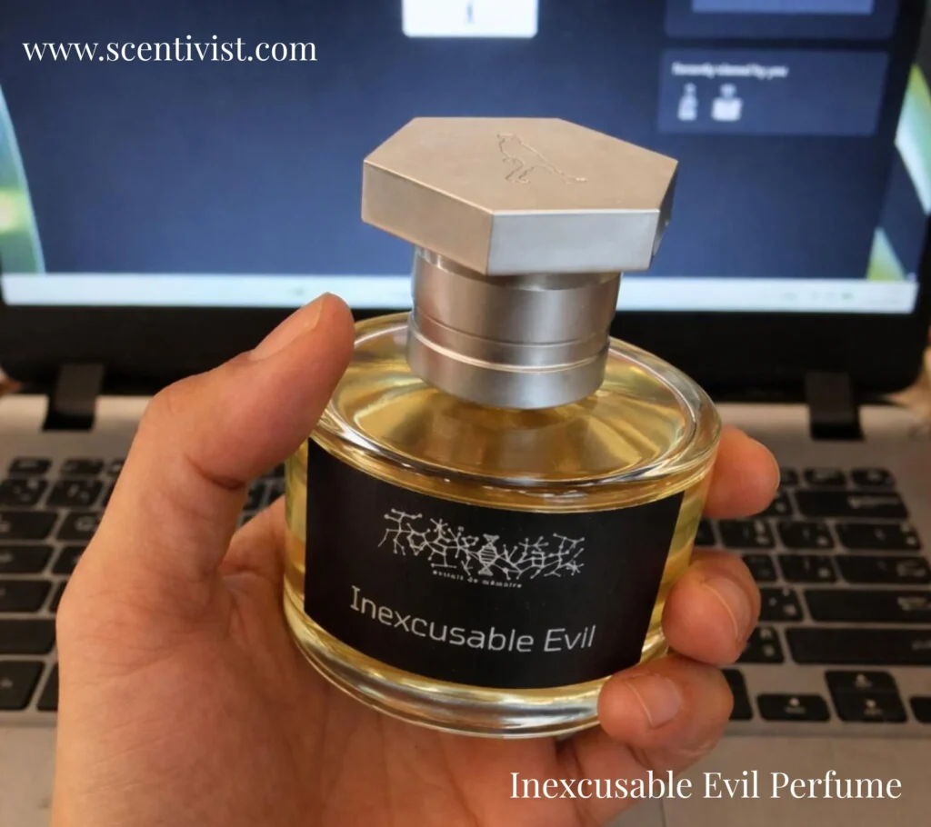 Inexcusable Evil perfume bottle held in hand, showcasing its bold design and unique look.