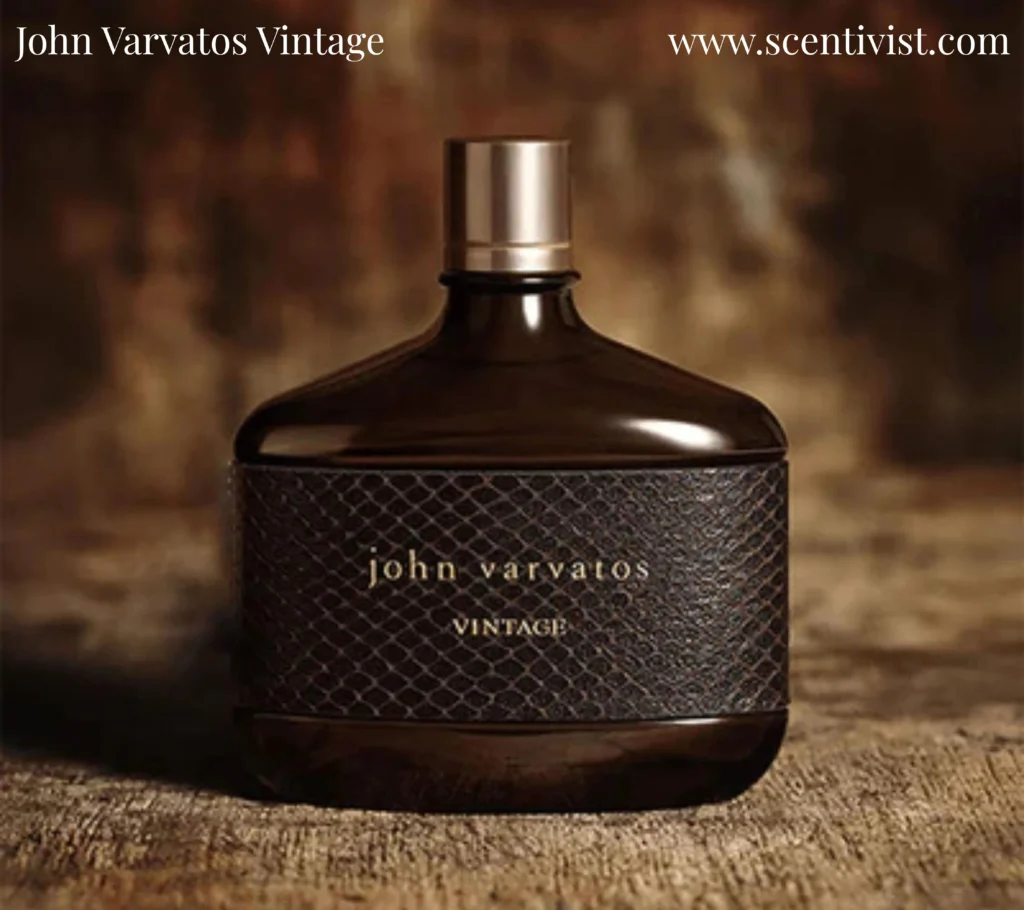 John Varvatos Vintage Eau de Toilette bottle placed on a rustic wooden surface.