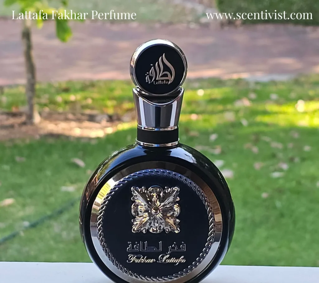 Close-up of Lattafa Fakhar Perfume bottle showing gold detailing.