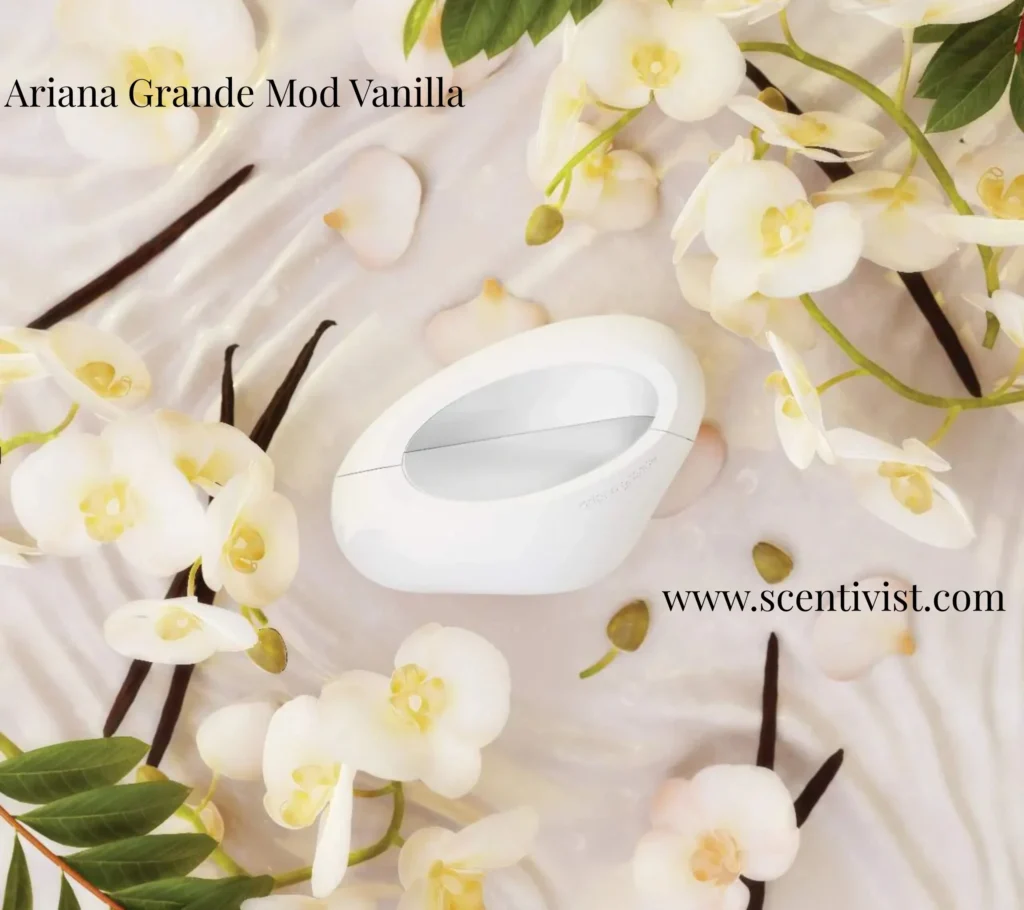 Mod Vanilla Eau de Parfum by Ariana Grande displayed with a soft white flowers background, highlighting its elegant and sweet fragrance theme.