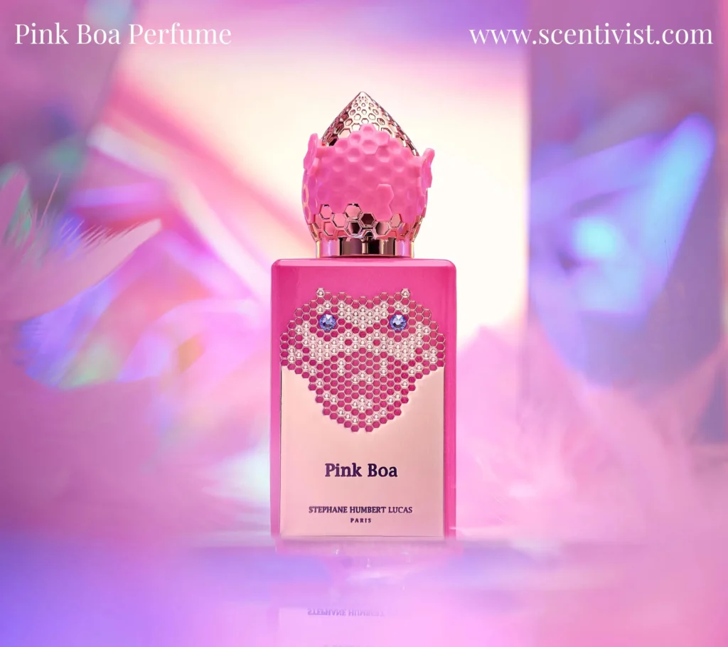 Pink Boa Perfume by Stéphane Humbert Lucas bottle with vibrant pink design and snake-inspired jewel pattern on a colorful iridescent background.