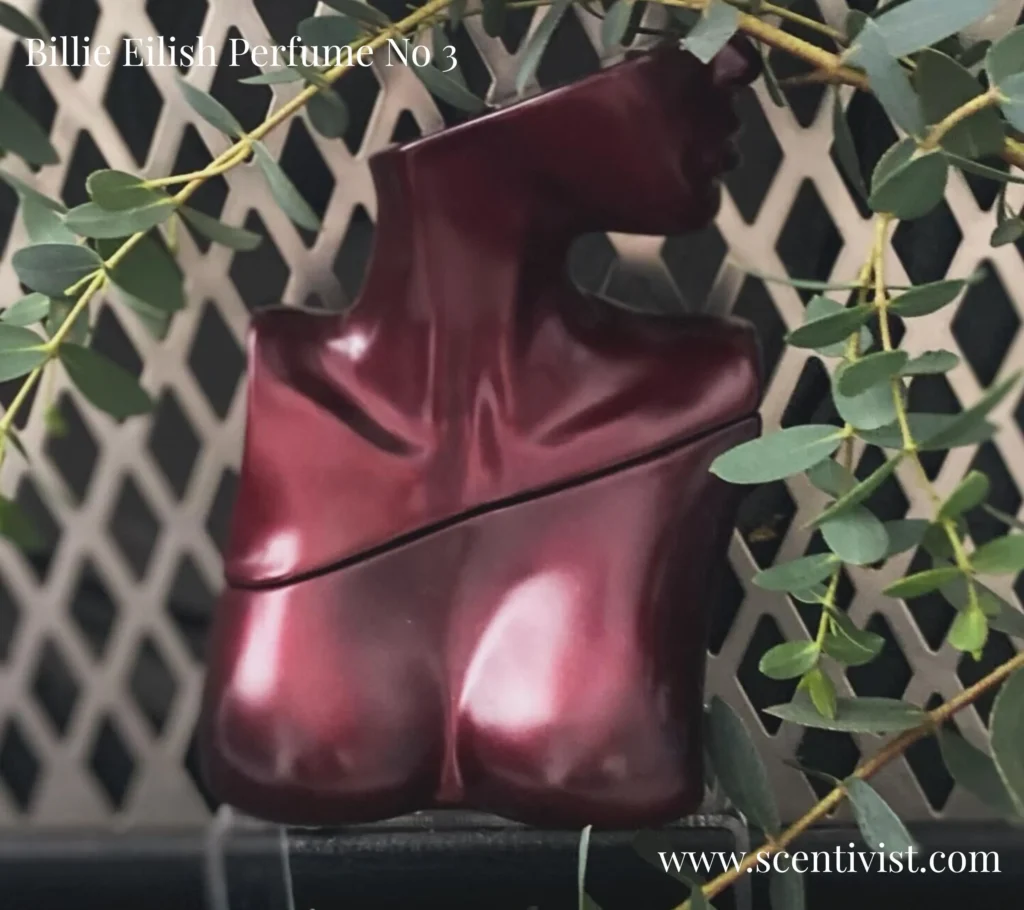 Eilish No. 3 Eau de Parfum by Billie Eilish featuring the signature red sculpted bust perfume bottle design.