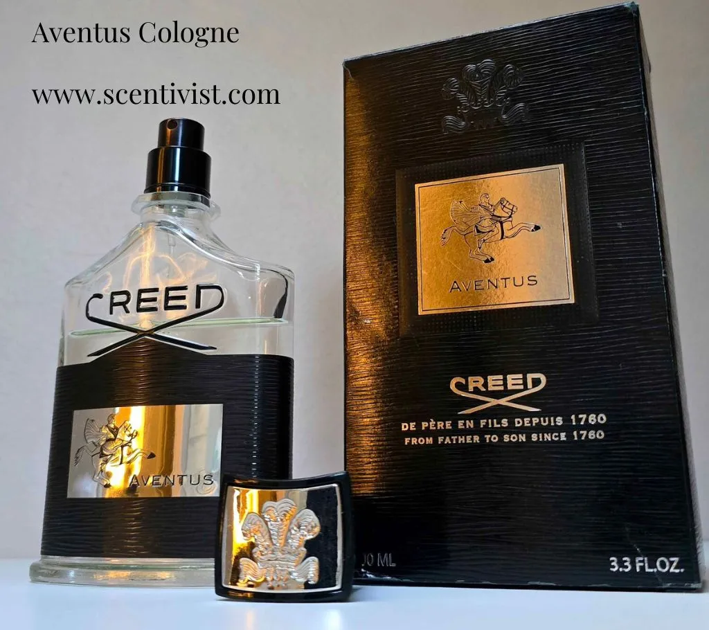 Bottle of Aventus Cologne by Creed displayed alongside its original white box packaging featuring the iconic Creed logo, highlighting the elegant design and premium presentation.