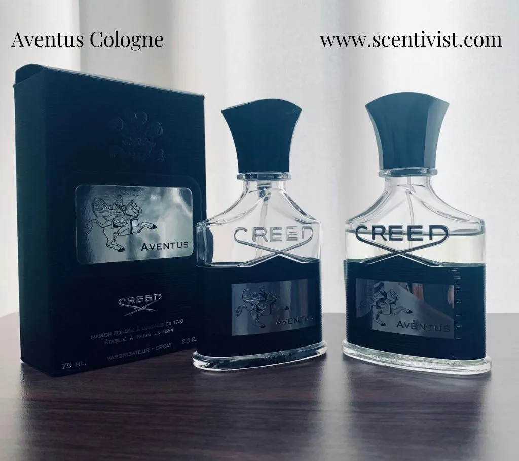 Two bottles of Aventus Cologne by Creed placed side by side, showcasing the sleek glass design and signature black label of the iconic fragrance by Creed.