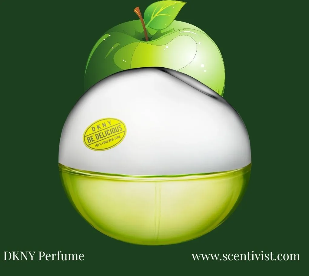 DKNY perfume Be Delicious bottle shaped like a green apple with a metallic silver top on a dark green background.